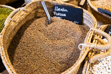 Fototapeta na wymiar Raw lentils in wicker basket