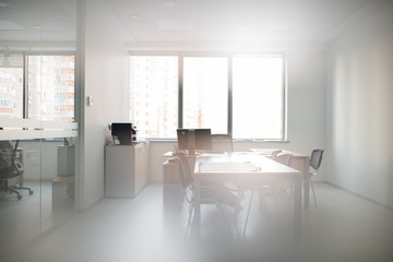 Modern interior of office for small conference meetings with table and desktop computer