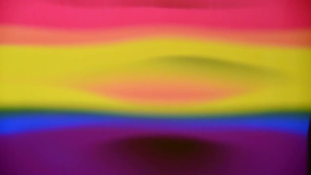 Wavy reflection of Gay Pride Flag. Abstract background concept