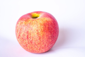 Fototapeta na wymiar Red apple on grey background.