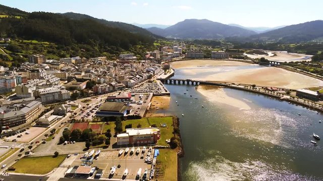 Aerial view of the town of Viveiro, in Lugo province northwestern Galicia. with boat marina and sun light shining from the bay water, in Lugo province northwestern Galicia.