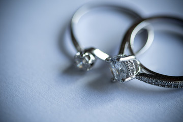 Close up  of two  diamond silver rings