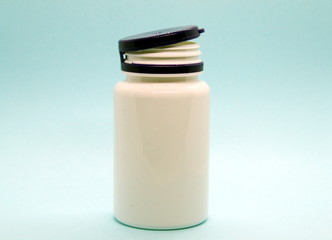 medicine jar on a blue background