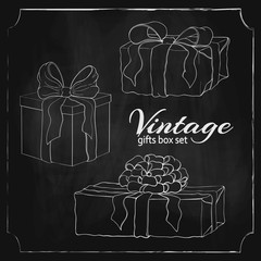 chalk drawn vintage gift box set. engraved illustration of presents isolated on black chalkboard. icon set of present boxes with bow and ribbon. wrapped gifts sketch. Silhouette of boxes on blackboard