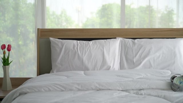 white comfortable pillow on bed decoration in bedroom