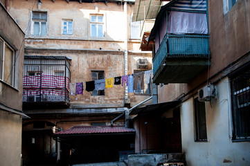Old authentic courtyard of Odessa, Ukraine. Traditional house with old windows. city landscape