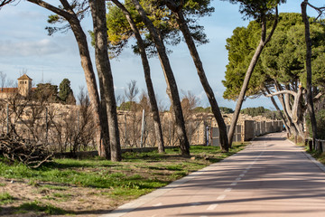 Fototapeta na wymiar Platja de Les Muscleres in La Escala behind the ruins of Empuries, in the Province of Giron, Catalonia, Spain.