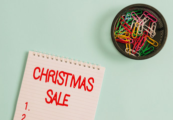 Conceptual hand writing showing Christmas Sale. Concept meaning period during which a retailer...