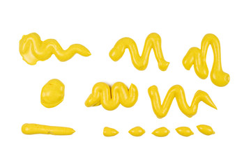 Yellow cheese sauce splashes isolated on white background.