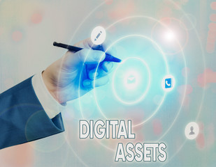 Conceptual hand writing showing Digital Assets. Concept meaning has value and can be owned but has...