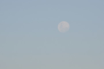 moon in empty colourful sky