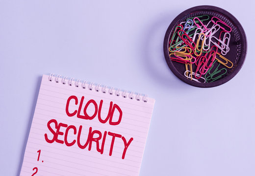 Conceptual hand writing showing Cloud Security. Concept meaning protection of data stored online from theft and deletion Blank notebook and stationary placed above pastel colour backdrop