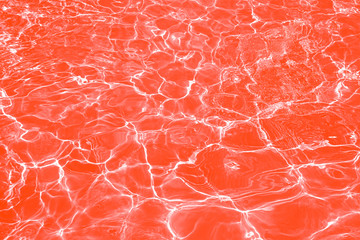Abstract red clear water. Neon light water effect.