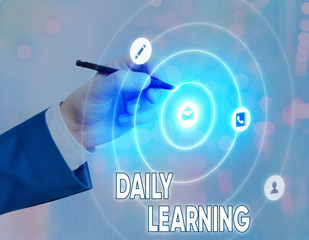 Conceptual hand writing showing Daily Learning. Concept meaning The everyday acquisition of...