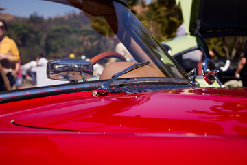 red car windshield detail