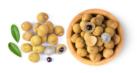 Longan in wood bowl isolated on white background