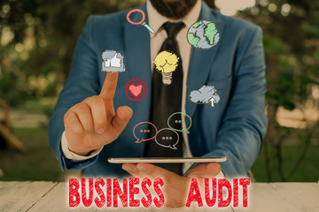 Word writing text Business Audit. Business photo showcasing examination of the financial report of...