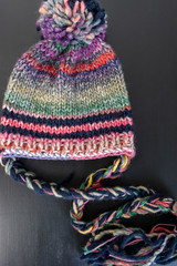 pompom hat on back background 