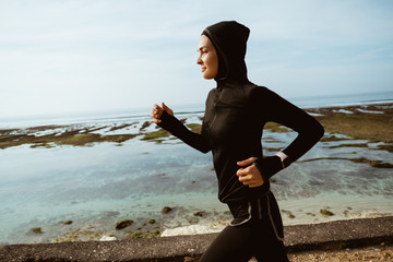 portrait of muslim sport runner woman outdoor