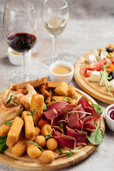 various snacks for wine cheese, salami, prosciutto