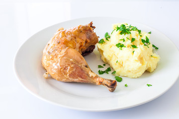 Chicken drumstick with potato