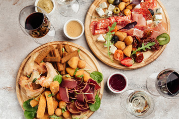 portioned snacks canapes and sandwiches with meat, cheese and vegetables