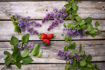 Morning beverage in the garden with flowers, fruit and tea