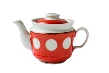 Red teapot with white polka dots isolated on a white background.