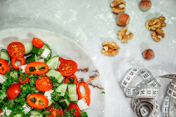 The concept of weight loss, excess weight. Sport and healthy lifestyle, diet and vegitarianism. Tape