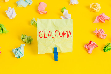 Writing note showing Glaucoma. Business concept for Eye diseases which result in damage to the...