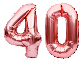 Number 40 forty made of rose golden inflatable balloons isolated on white. Helium balloons, pink...