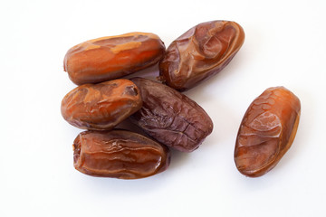 Dried dates fruit isolated on white background