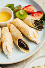 many types of pancakes with fillings in the restaurant menu
