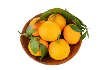 a plate with some tangerines isolated on white background