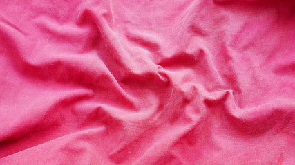 red silk fabric background. pink cotton cloth texture