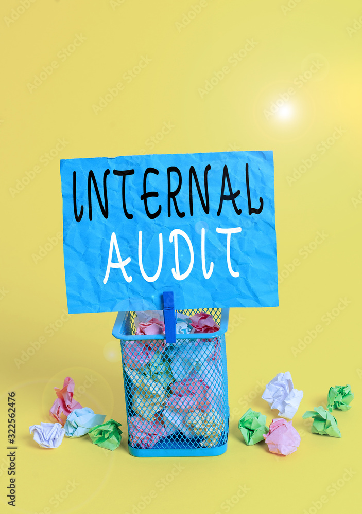 Poster writing note showing internal audit. business concept for evaluating and improving the effectiveness