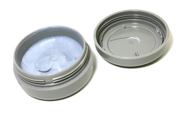 jar of cosmetic cream isolated on white