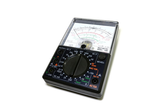 Analog black multimeter Laying on a white background. Lumphun Thailand : 24 January 2019