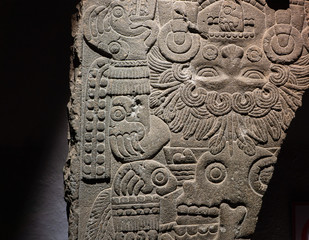 Fragment of ancient aztec sculpture in Great Temple (Templo Mayor). Culture of native americans. Travel photo. Mexico city