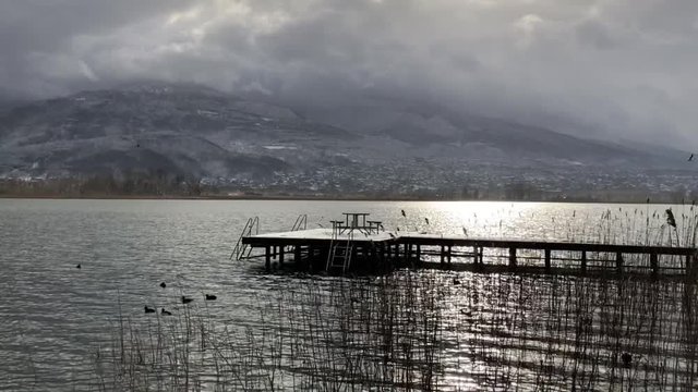 Wooden walkway in snow storm weather