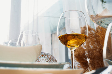 Table setting with stylish dishware on beige tablecloth
