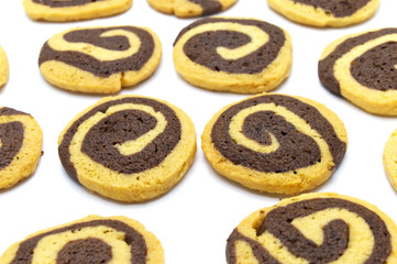 Cookies in the shape of a spiral pattern isolated on a white background. Handmade biscuits.