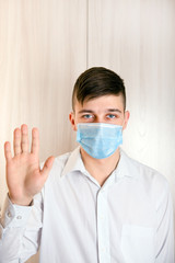 Young Man in Flu Mask