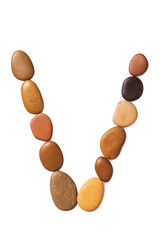 Letter V made of marine small pebbles. Alphabet made of stones Isolated on a white background