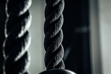 Close up photo of a tricep rope gym equipment - obrazy, fototapety, plakaty