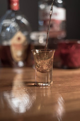 liquid that runs in shot glass, old school look