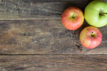 Three Apples on Wood Table