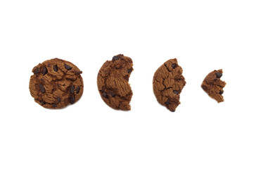 Set of bitten chocolate chip cookie isolated on white background.