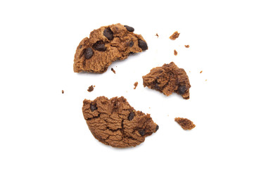 Chocolate chip cookies with some broken and crumbs isolated on white background in Top view.
