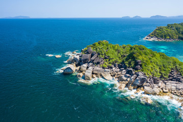 Tropical beach and rocky coastline and beautiful forest. Nga Khin Nyo Gyee Island Myanmar